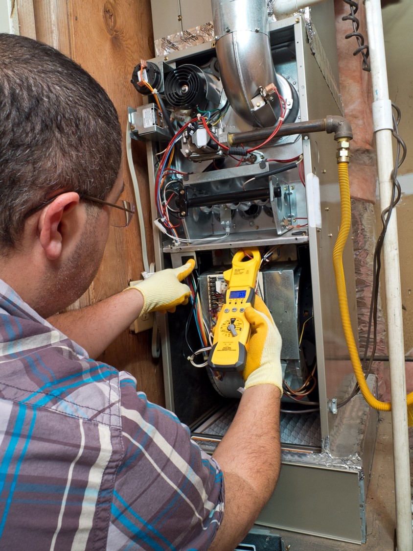 Man fixing boiler